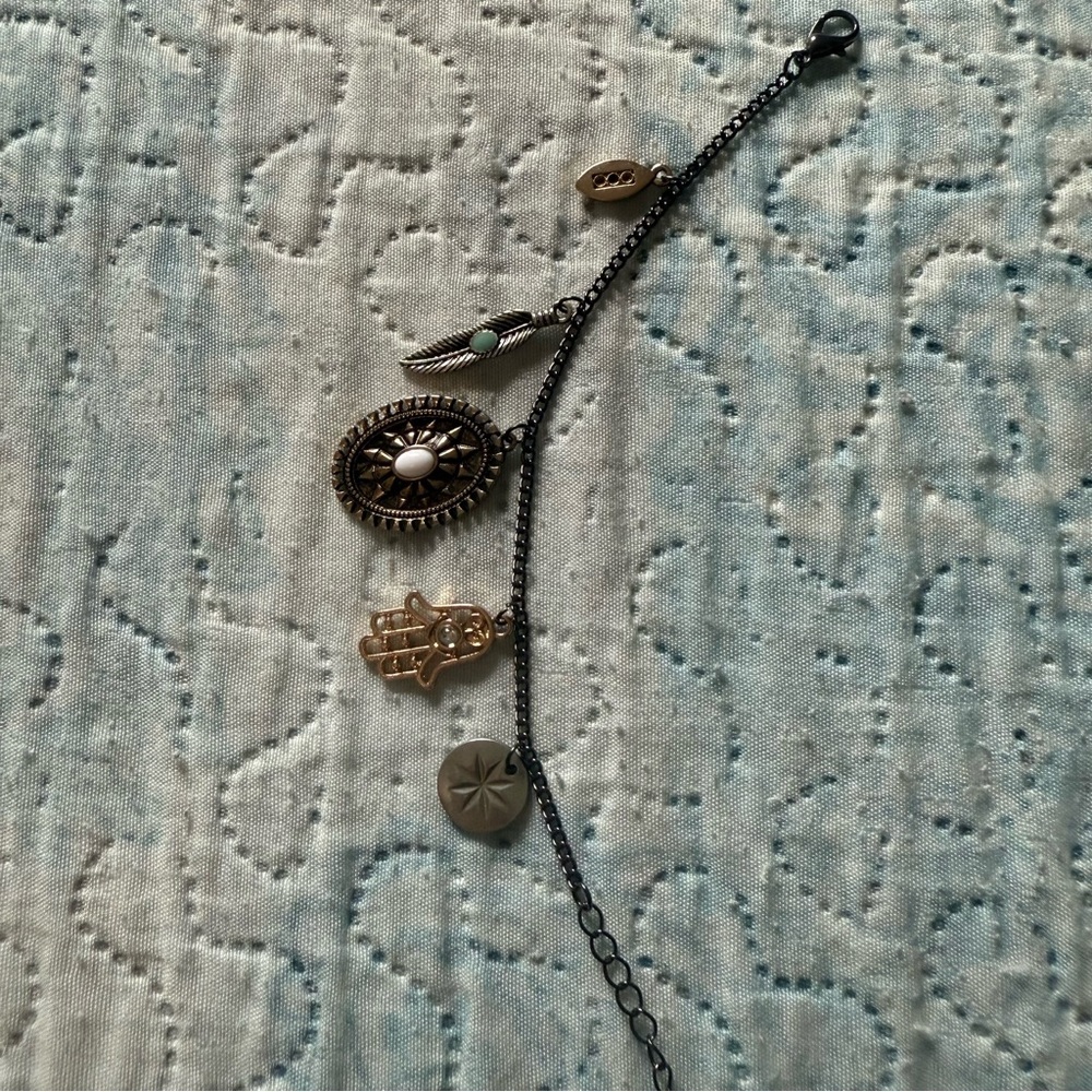 Elegant Multi-Charm Bracelet in Black and Gold - Picture 8 of 9